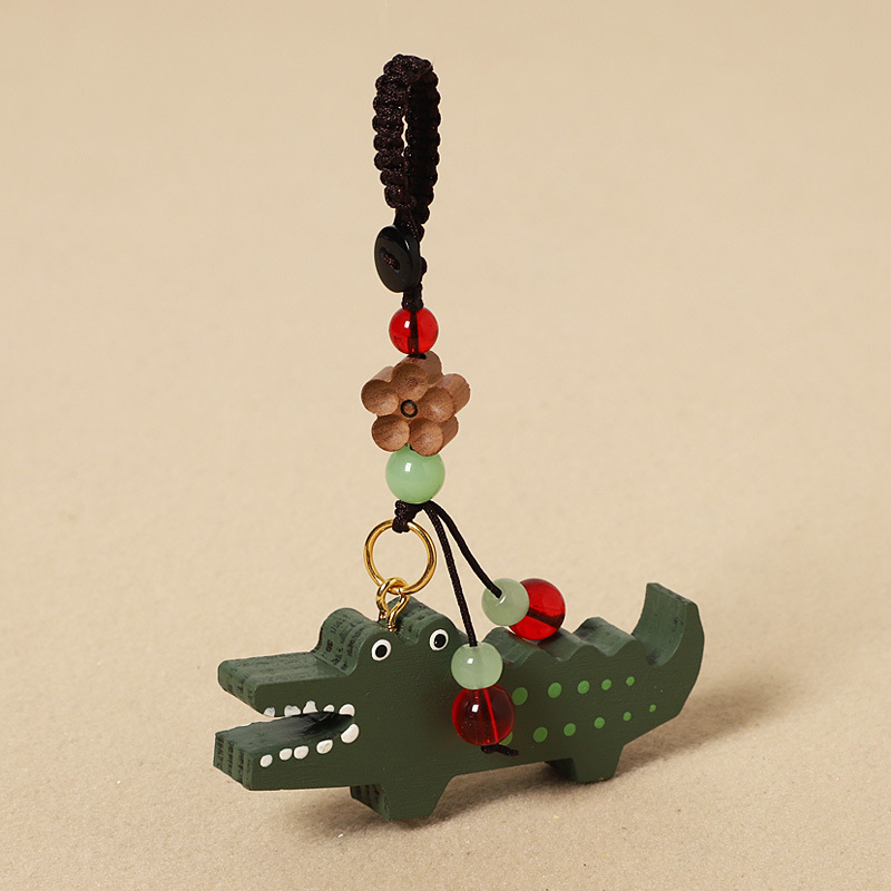 Wood carving small crocodile-peach wood plum blossom style