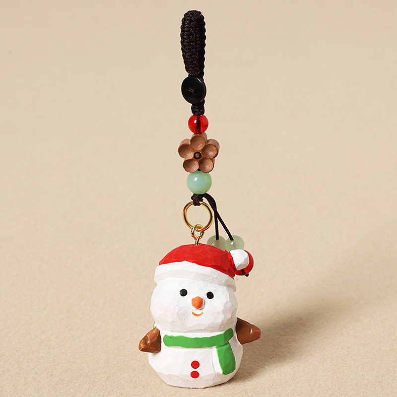 Wooden carved snowman - peach wood plum blossom design