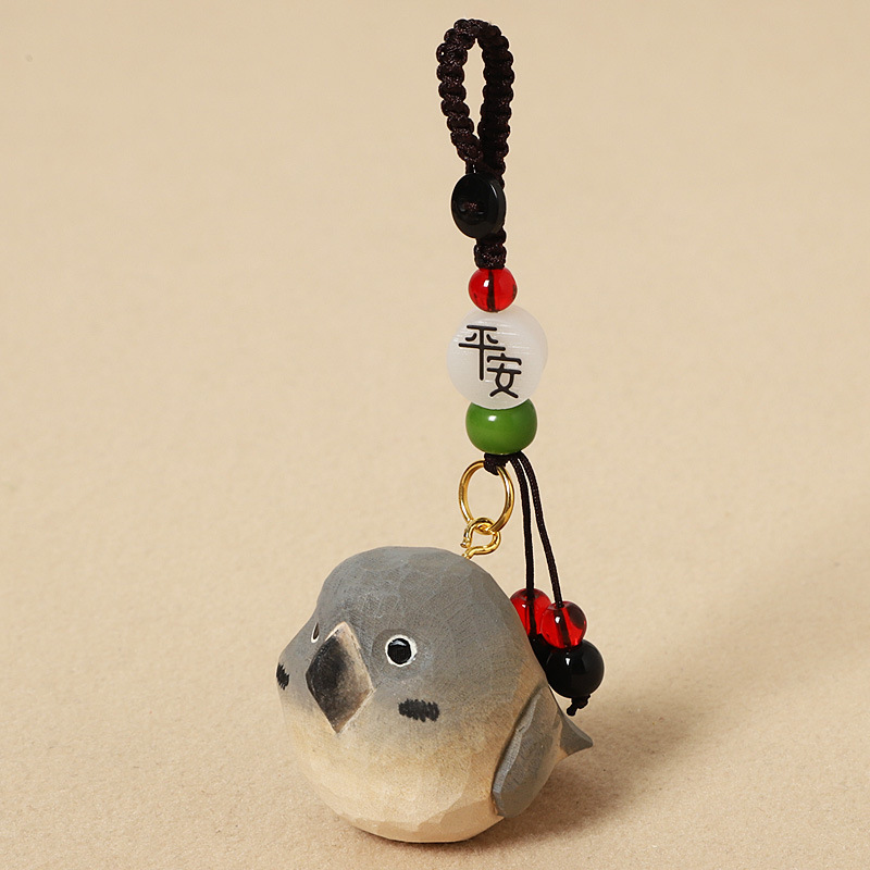 Wood carving gray parrot - peace edition
