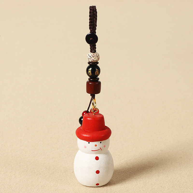 Wooden carved snowman - six-syllable mantra edition