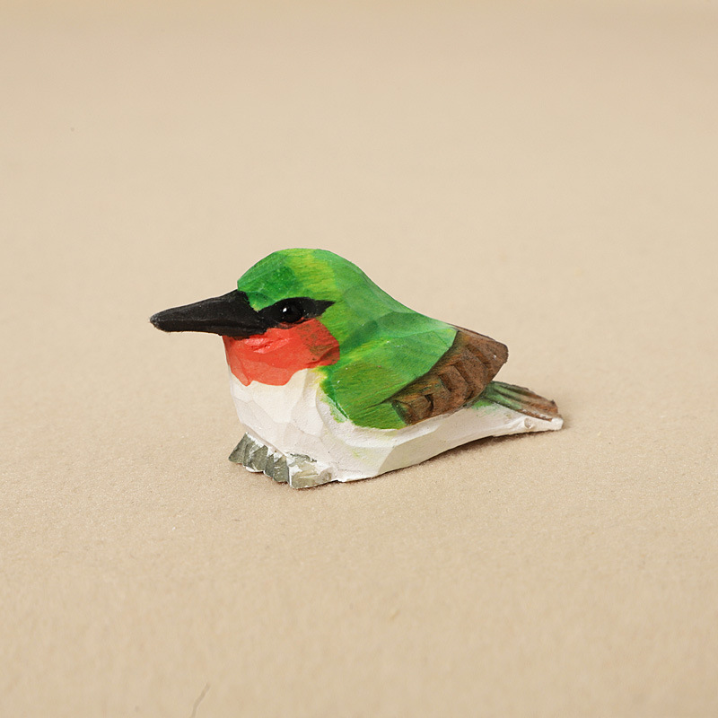 Wood carving hummingbird-ornament style