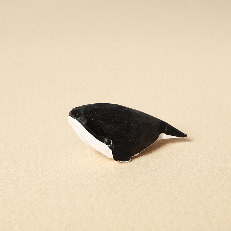 Wood carving striped black whale - individual ornament