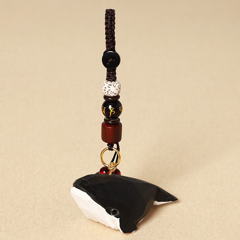 Wood carving striped black whale-six-character mantra