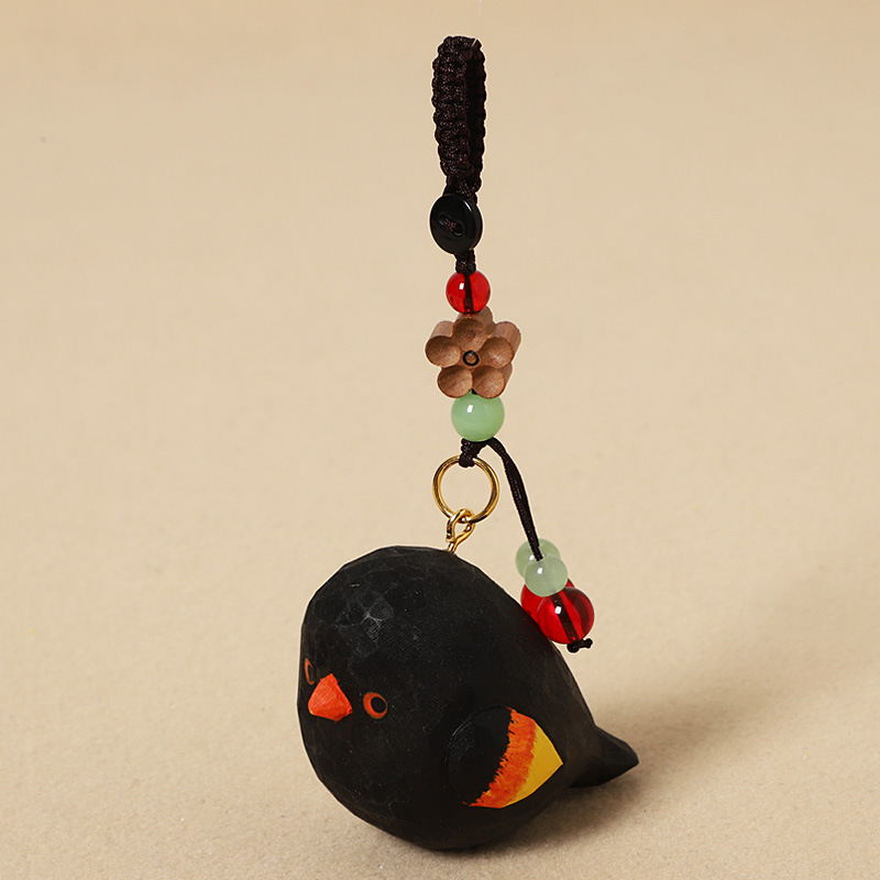 Wood Carving of Red-winged Blackbird - Peach Wood Plum Blossom Design