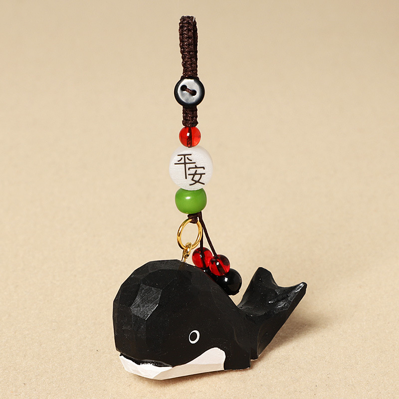 Wood carving black whale-safe model