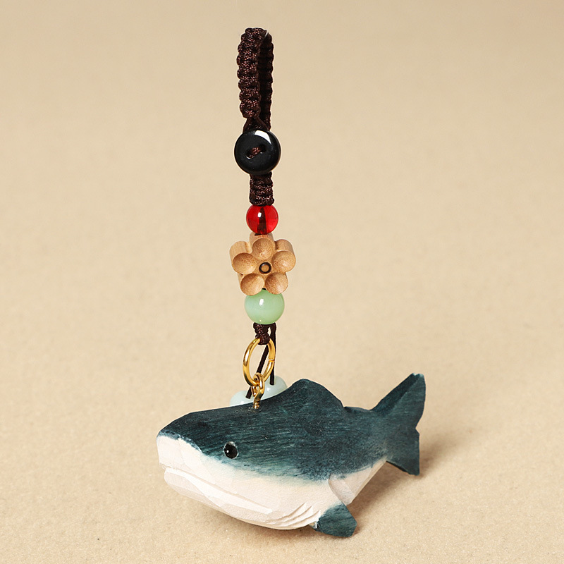 Wooden carved shark - peach wood plum blossom design