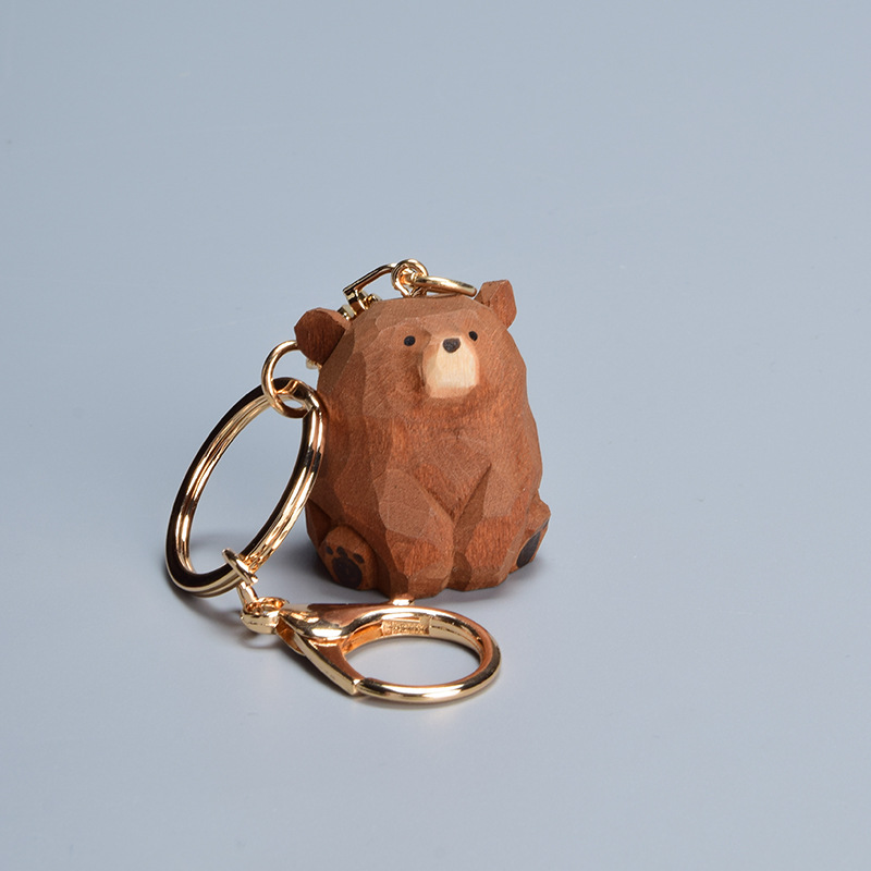 Pendant-carved brown bear
