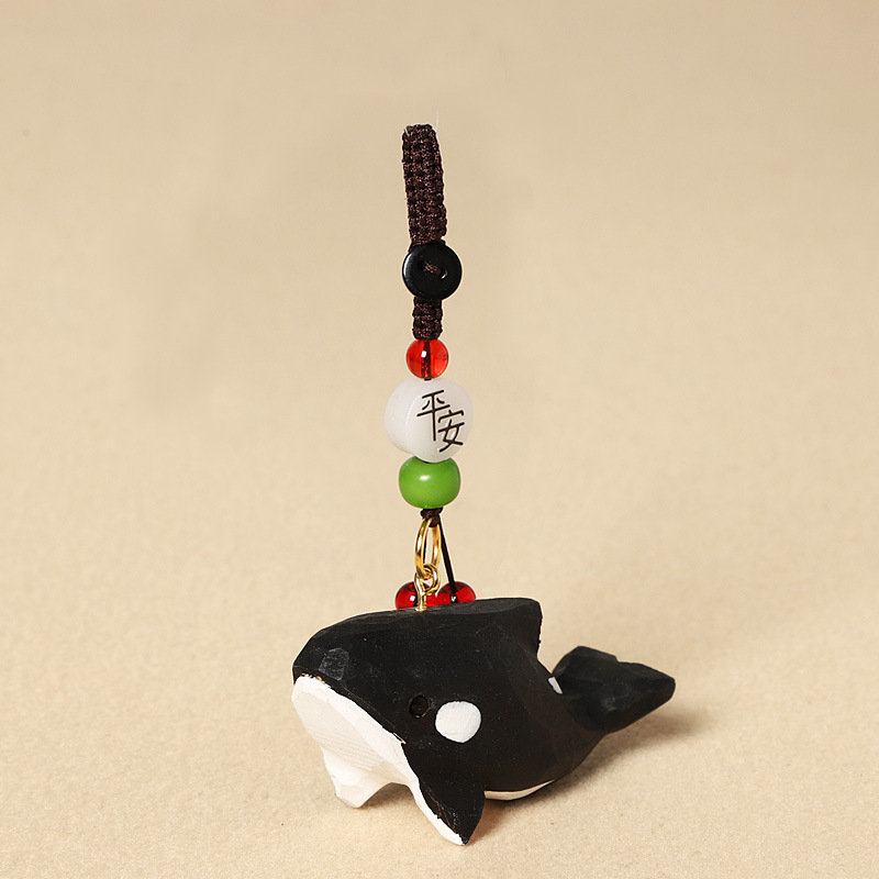 Wood carving killer whale-safe model