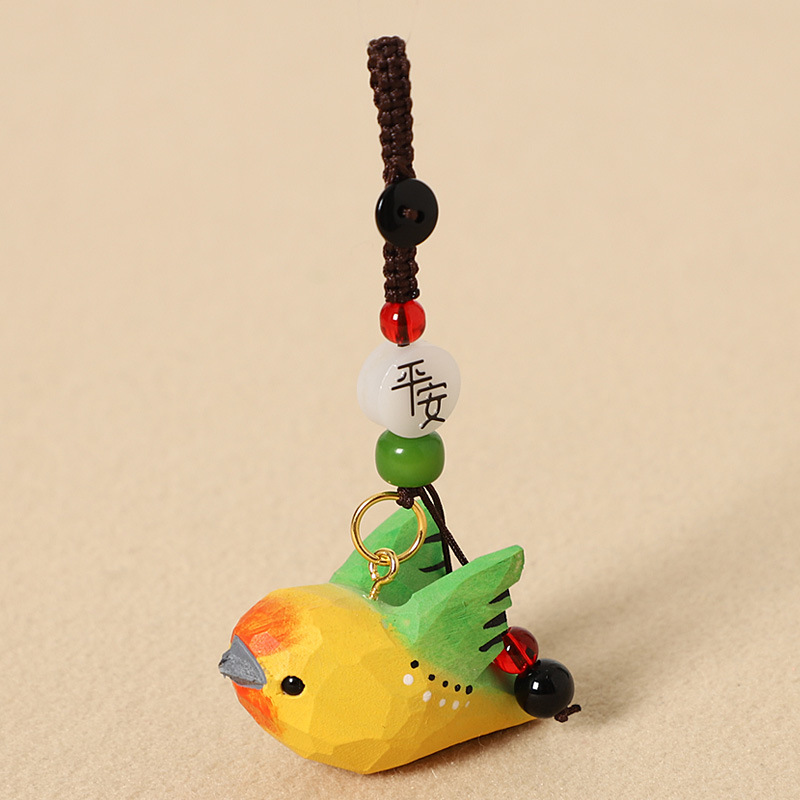 Wood-carved green bird with wings - Peaceful style