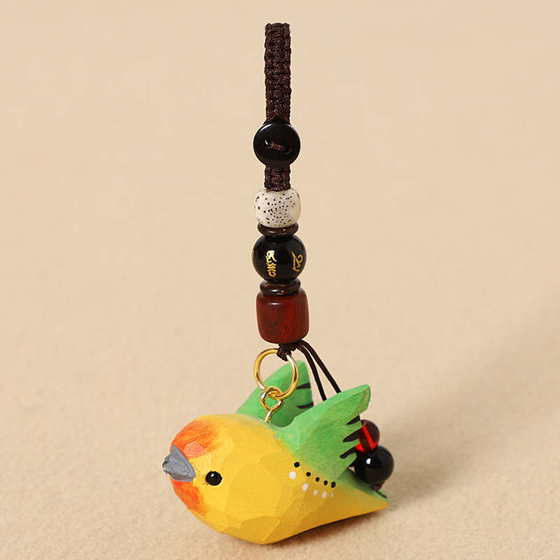 Wood-carved green bird with wings - Six-character mantra version