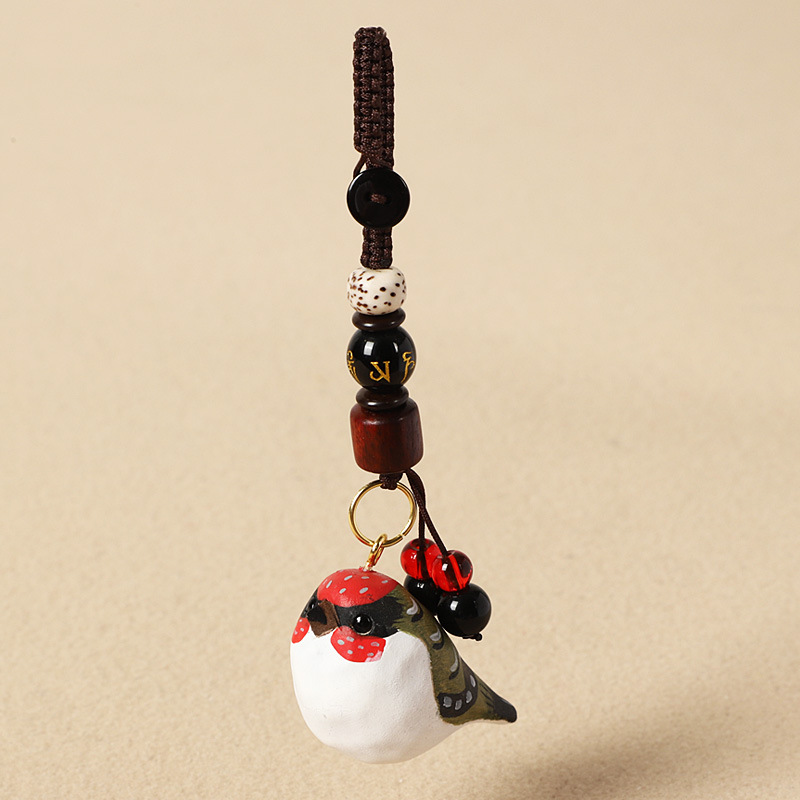 Wood carving red and green sparrow-six-character mantra