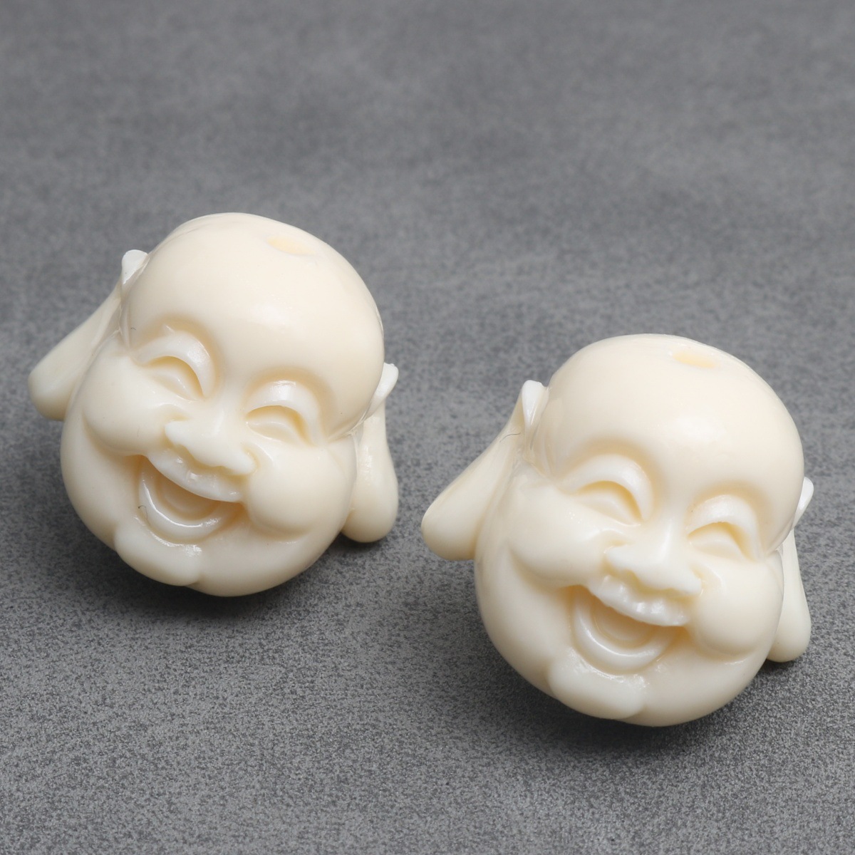 Buddha head 18x20mm (10 pieces per pack)