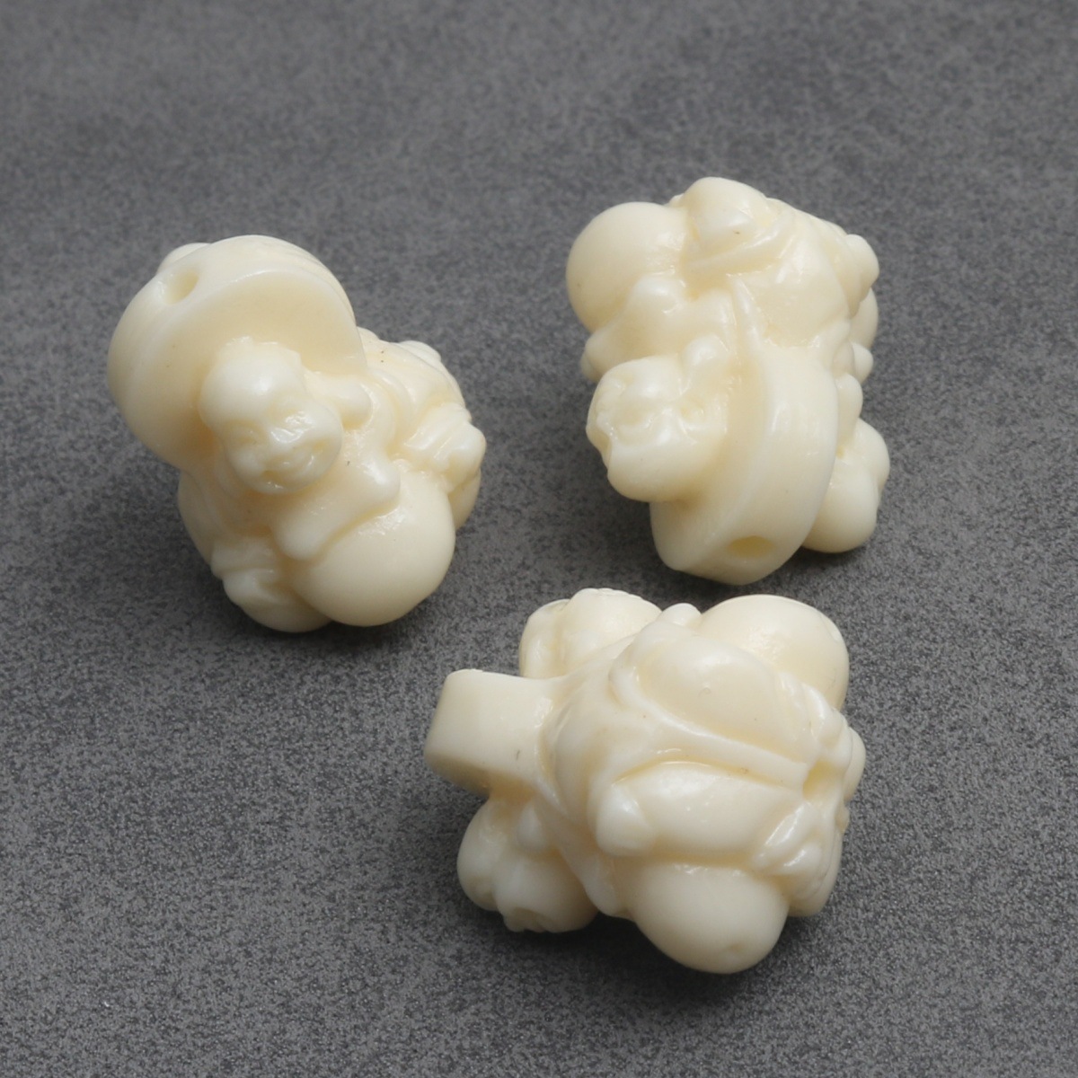 Double-sided buddha statue 11x14mm (10 pieces per pack)