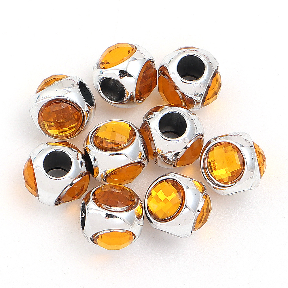 Orange three-sided diamond setting