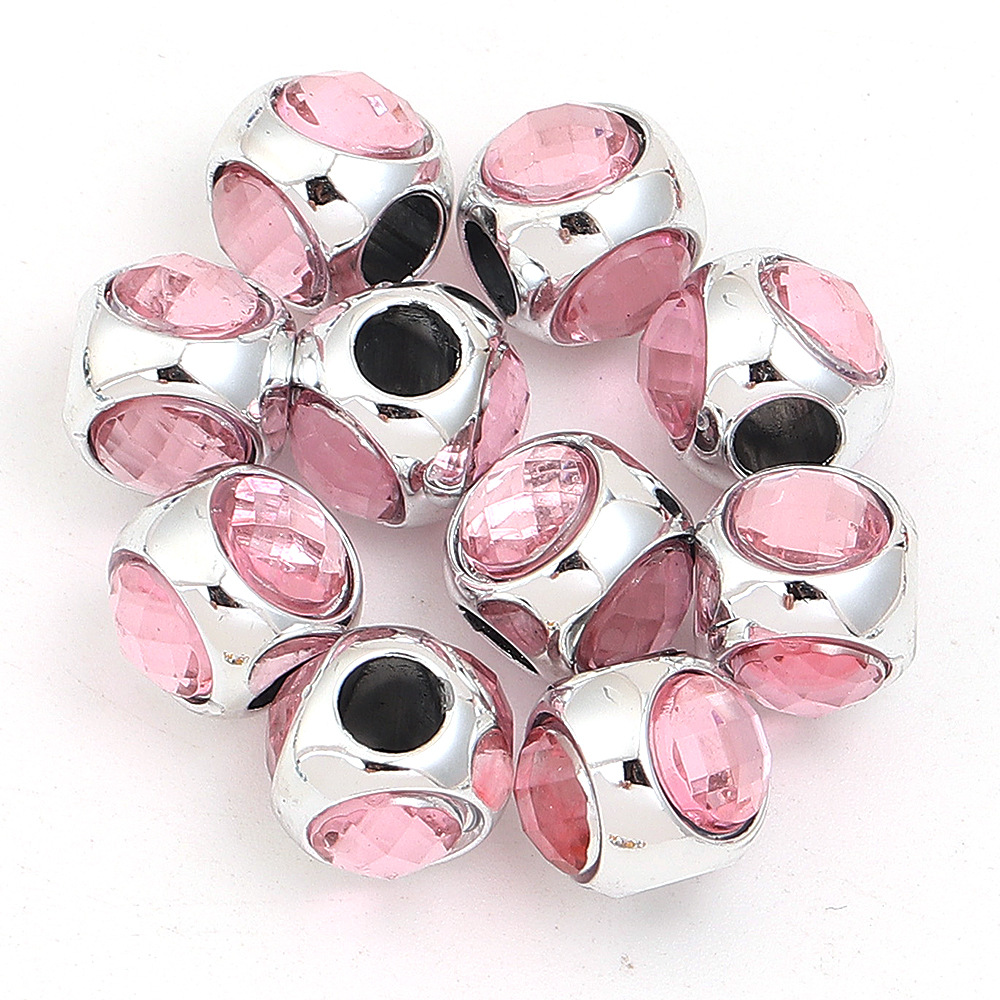 Pink three-sided diamond setting